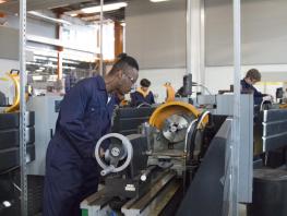 Students working on machinery in our Engineering workshops 