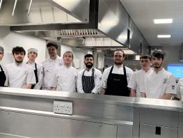 Photo of AHS cookery apprentices in kitchen at City campus. 