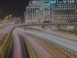 A night time view of the motorway and the financial district in Glasgow. 