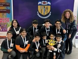 Curriculum Head Katie Jordan with competition winners the Lego Raiders 