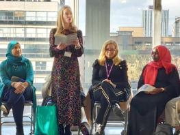 Poet Donna Ashworth performs her poetry for the workshop 