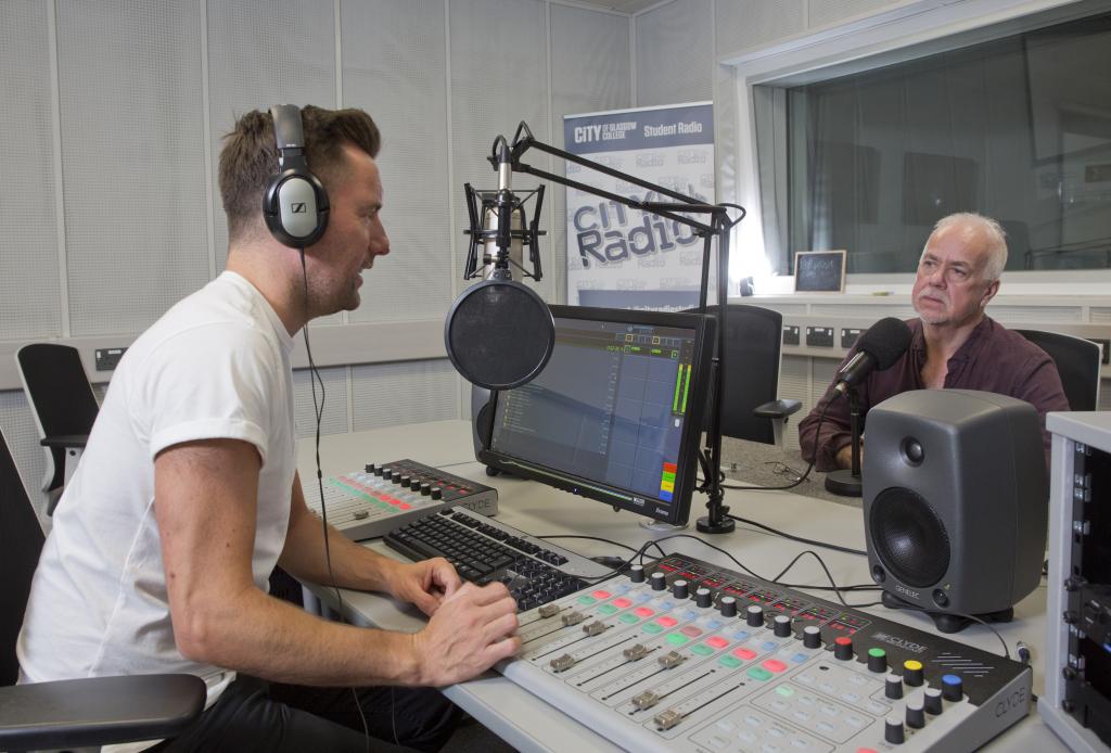 Radio students in the studio interviewing guests.