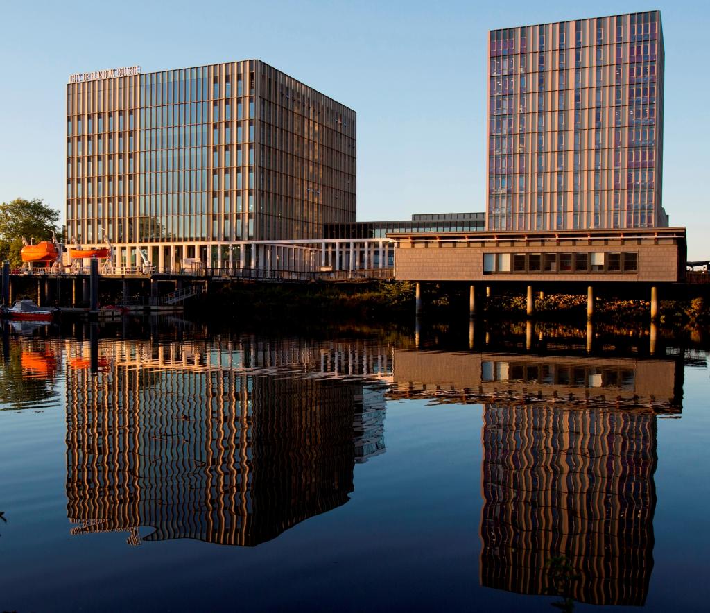 External photo of Riverside campus showing marine skills centre sitting over the River Clyde