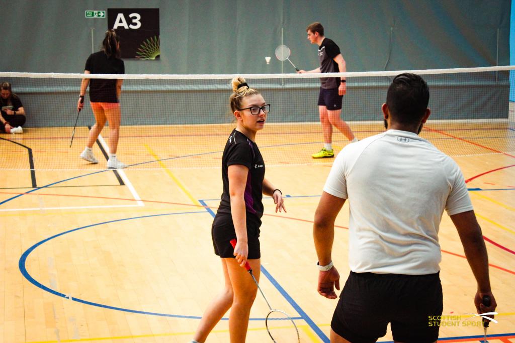 College sports students playing badminton