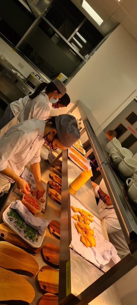 Professional Cookery students working in the kitchen at Scholars restaurant