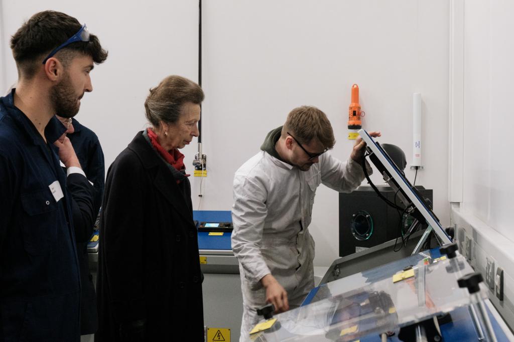 Princess Royal observing a student working in the ETO lab