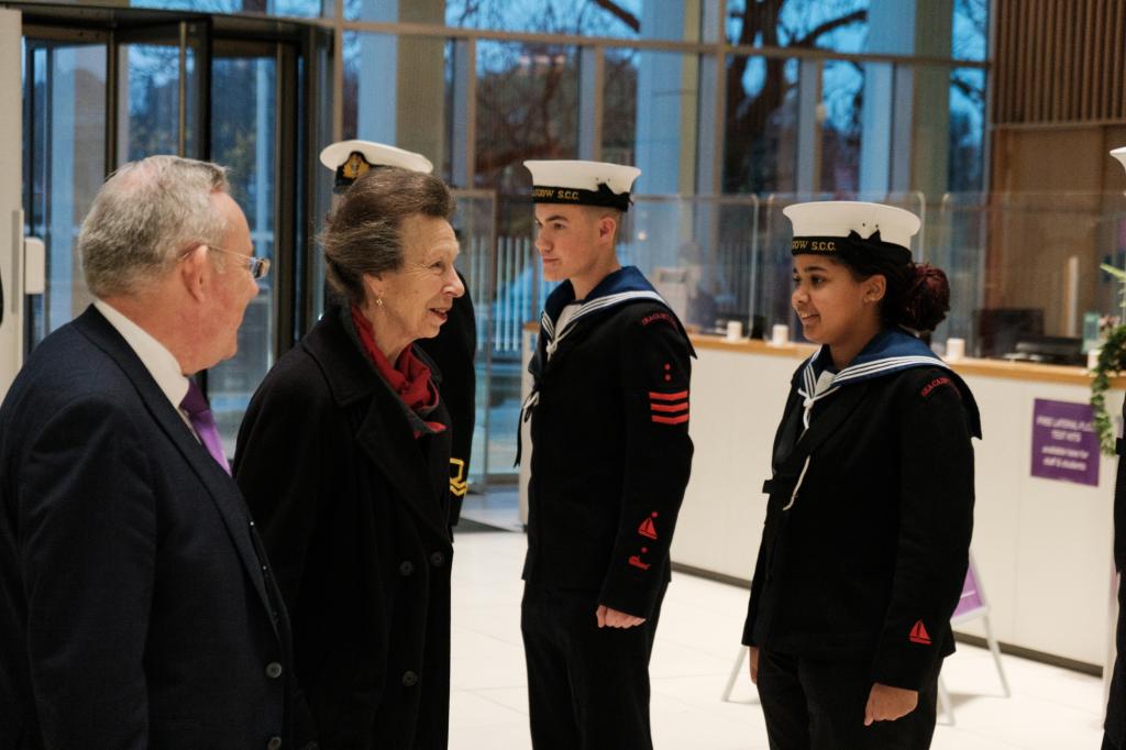 Princess Royal being greeted on campus by Nautical cadets