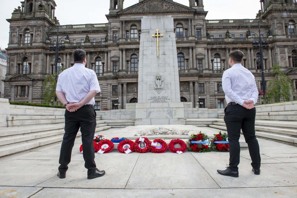 Cadets looking at the wreaths laid during the Merchant Navy Day ceremony.