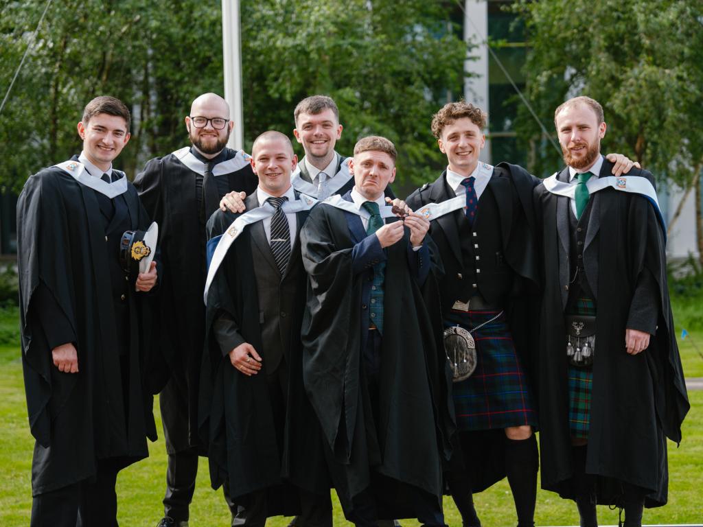 A group of students in academic gowns