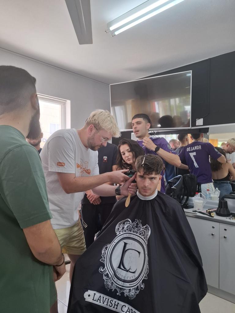 Giorgos Melas Barber doing the seminar at the Training institute Sxoli Papazoglou.