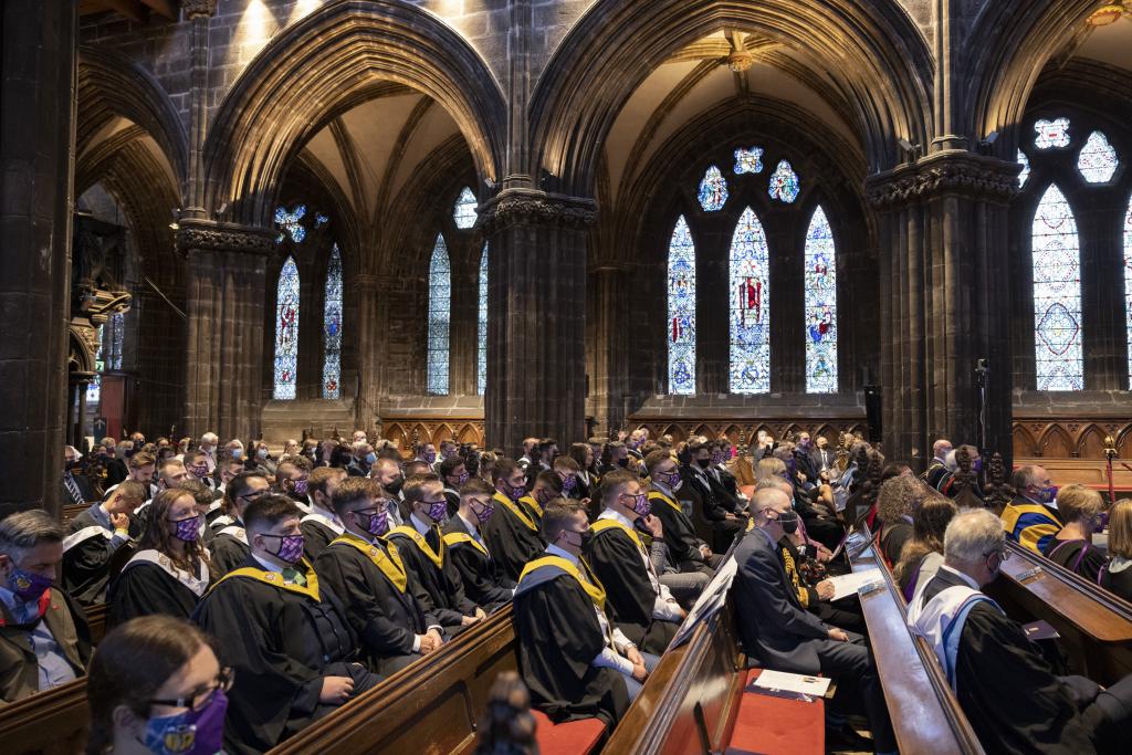 Students seated inside Glasgow Cathedral for the graduation ceremony.