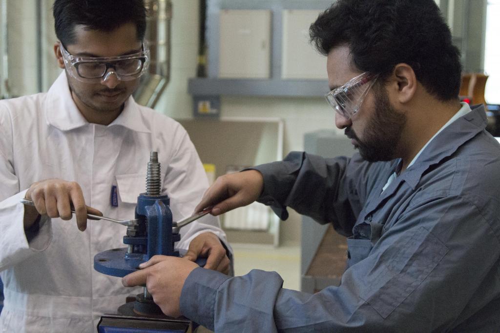 Engineering students in the workshop