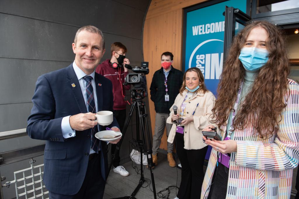 Students interviewing and filming Michael Matheson MSP, Scottish Government Cabinet Secretary for Net Zero, Energy and Transport