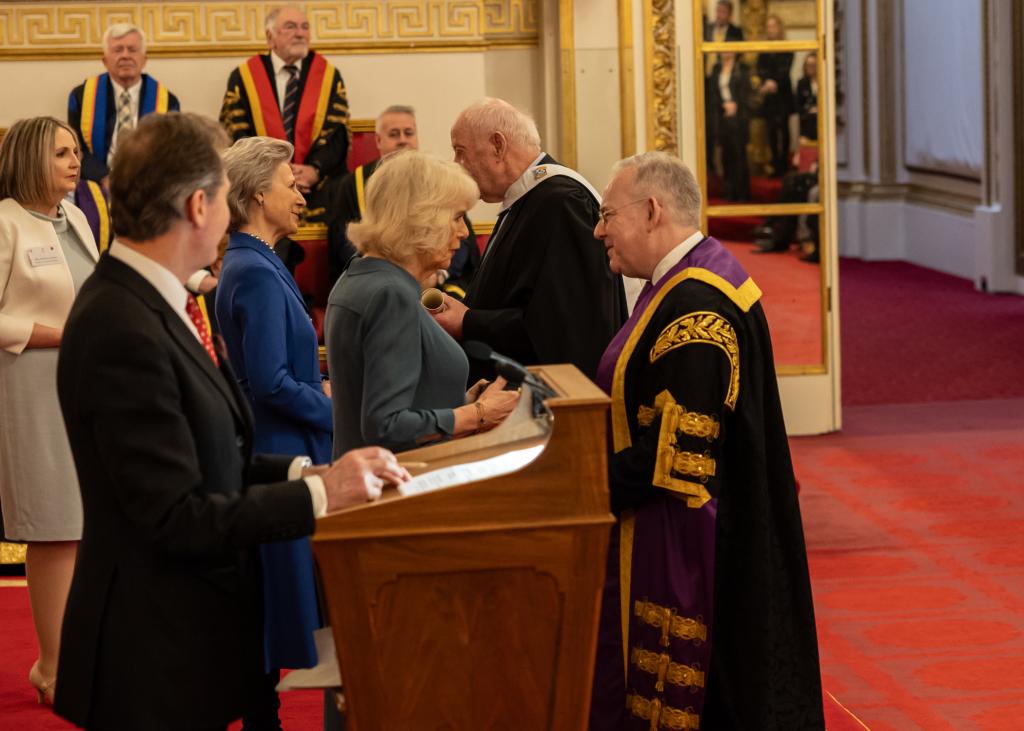 Her Majesty The Queen presenting Principal Paul Little, CBE with the Queen's Anniversary Award for research