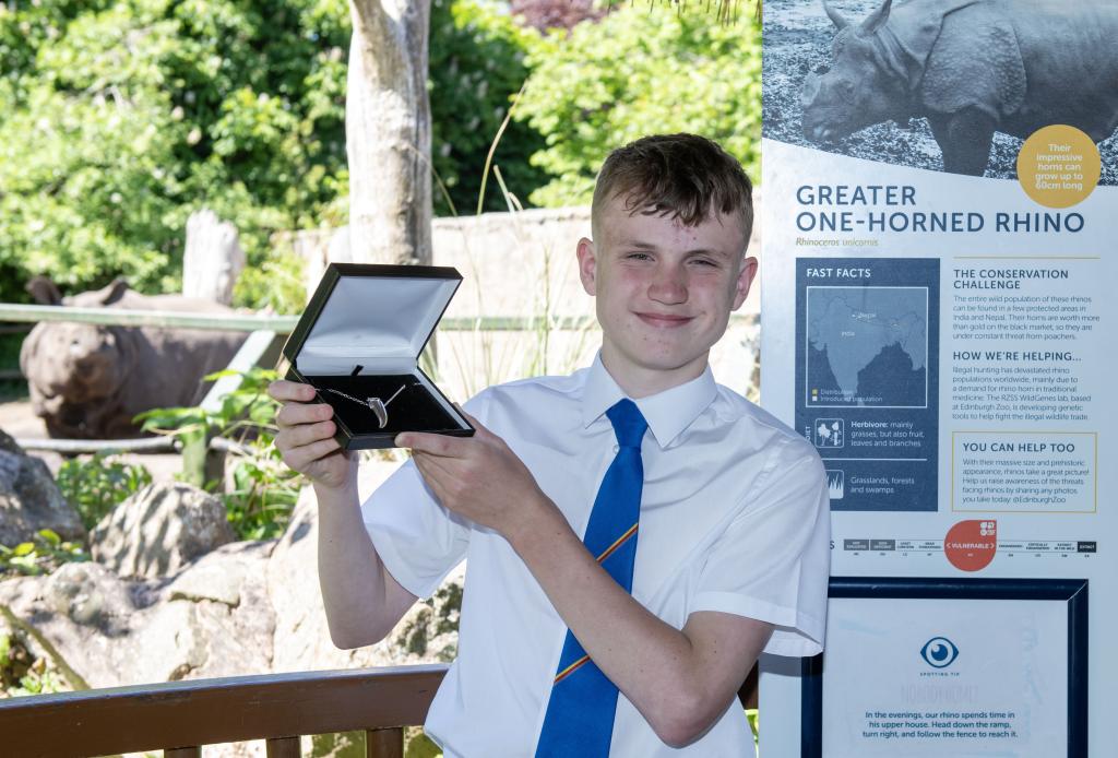 Scott Bannister of Eastwood High School with his winning design at Edinburgh Zoo