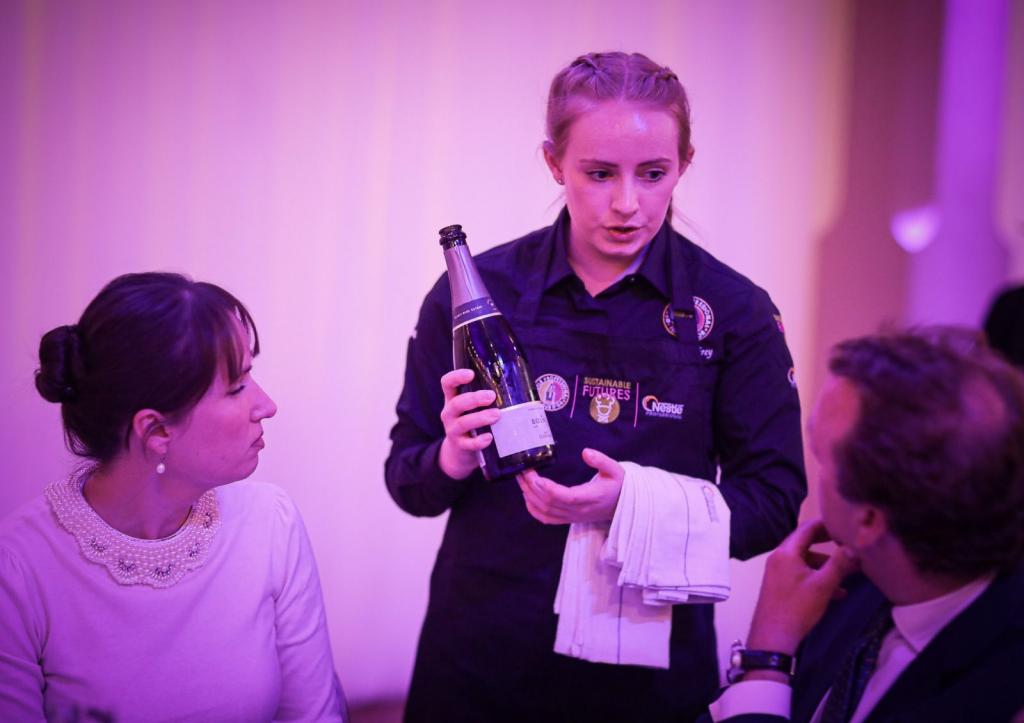 Tara Humphrey serving Front of House during final challenge of Toque d'Or competition.