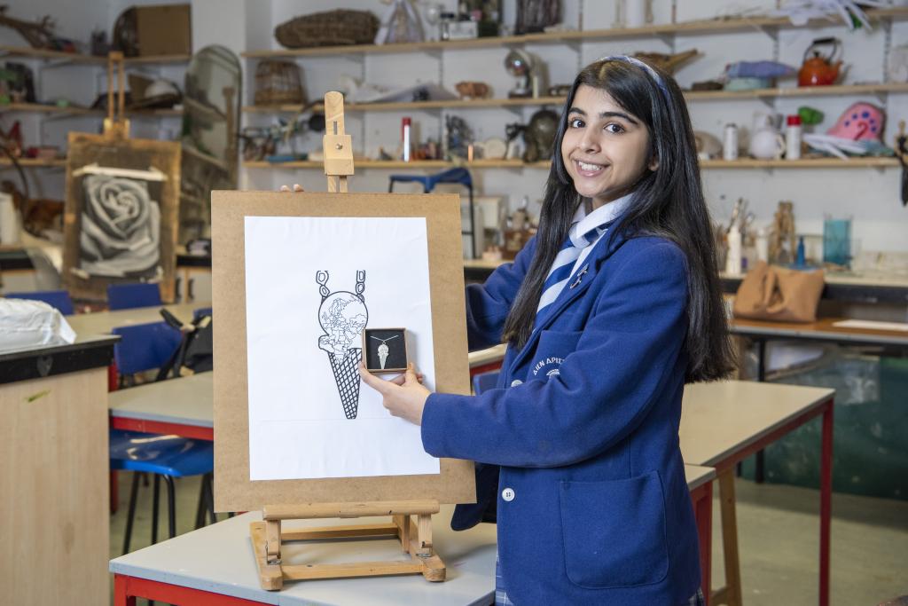 Ashley Tandon winner of the City of Glasgow College Jewellery Competition with her winning pendant and sketch.