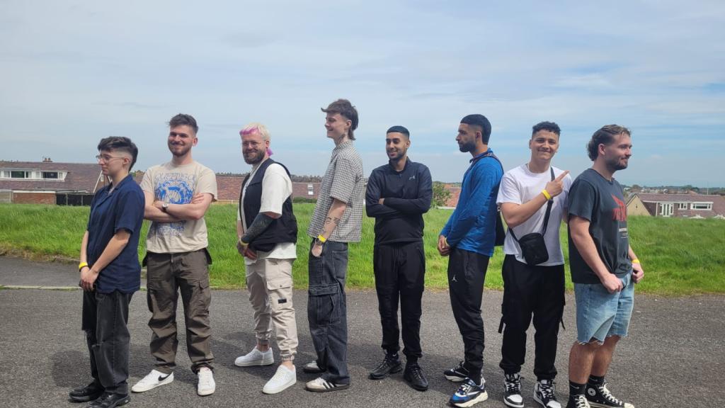 (L-R) - Model Katherine Barlow, George Croft, Level 5 student Aaron Fallon, model Gavin Thompson, Level 5 student Faizan Rauf, model Osama Pervaiz, Level 5 student Abdulhadi Fasi, model Kyle McArthur