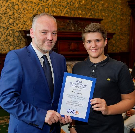 Carli Daniels is presented with her 2016 IFSD Glasgow Student Award by Kevin Rush, Head of Economic Development, Glasgow City Council Carli Daniels is presented with her 2016 IFSD Glasgow Student Award by Kevin Rush, Head of Economic Development, Glasgow City Council
