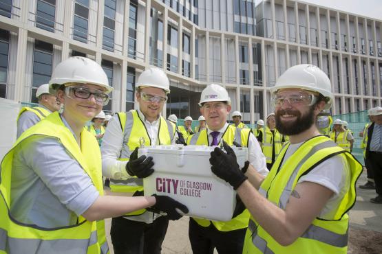 Left to Right – HND Product Design students: Hannah Dunn, David McFarlane and Fraser McPhee; Principal and Chief Executive Officer, Paul Little Left to Right – HND Product Design students: Hannah Dunn, David McFarlane and Fraser McPhee; Principal and Chief Executive Officer, Paul Little
