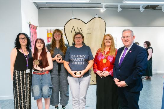Lisa McGovern with student medal winners and Principal Paul Little