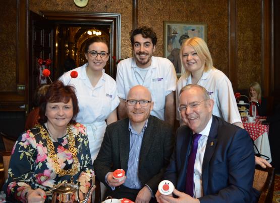 CoGC bakery students serve Lord Provost a Red Nose Tea
