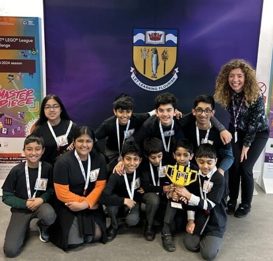 Curriculum Head Katie Jordan with competition winners the Lego Raiders