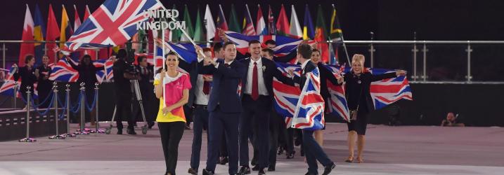 Group of people holding the British flag