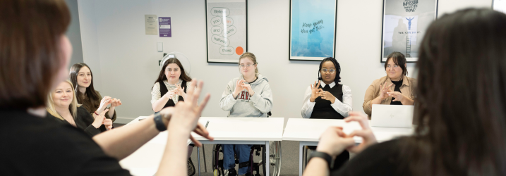 Students learning relevant training courses in British Sign Language