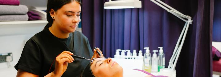 Students working on live clients in Amethyst Training rooms.