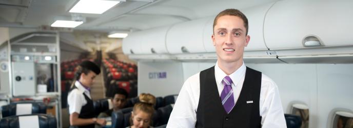 Cabin Crew students in our mock airline cabin at City campus.