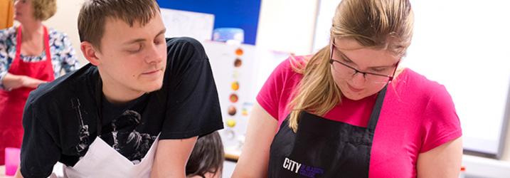 Students cooking. Students cooking.