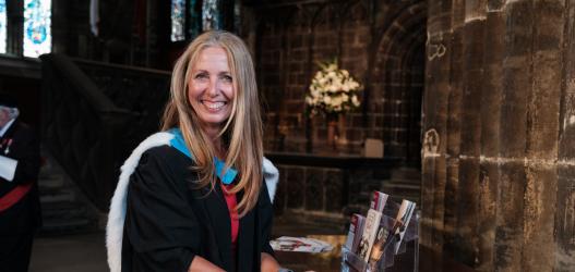 Carla Gethin smiling at camera during the graduation