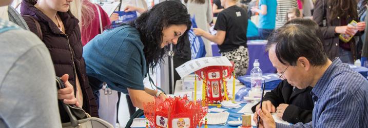 Students attending a stall at Freshers Fayre.