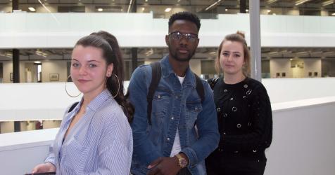 Students in atrium at City campus. Students in atrium at City campus.