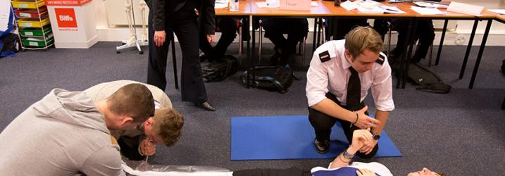 Nautical Students practising First Aid Skills.