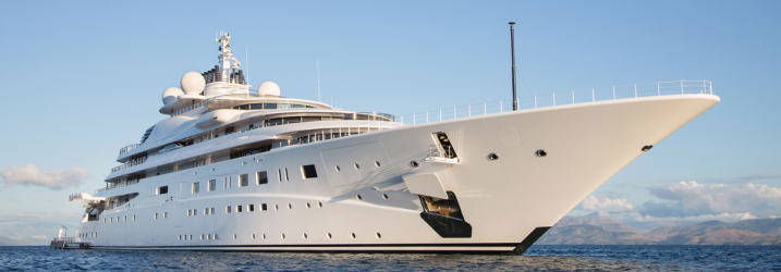 Superyacht sailing on the ocean.