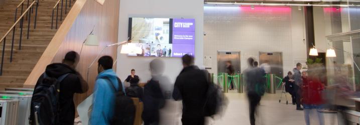 HNC students in the atrium at the City of Glasgow College Riverside campus.