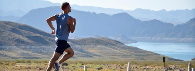 Man jogging along a road