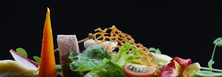 Plate of food prepared by professional cookery students.