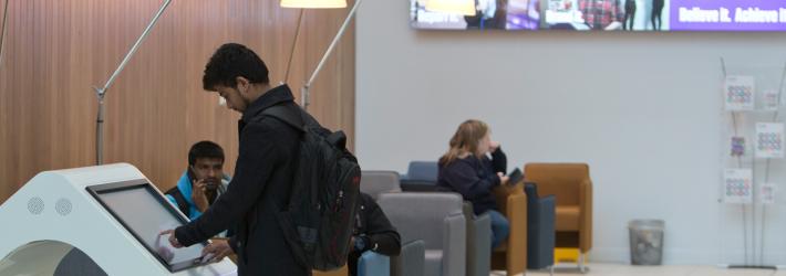 City of Glasgow College Student at a navigation pod